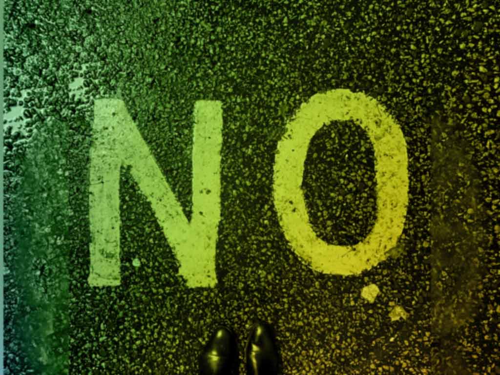 Big sign saying No as symbol for assertiveness